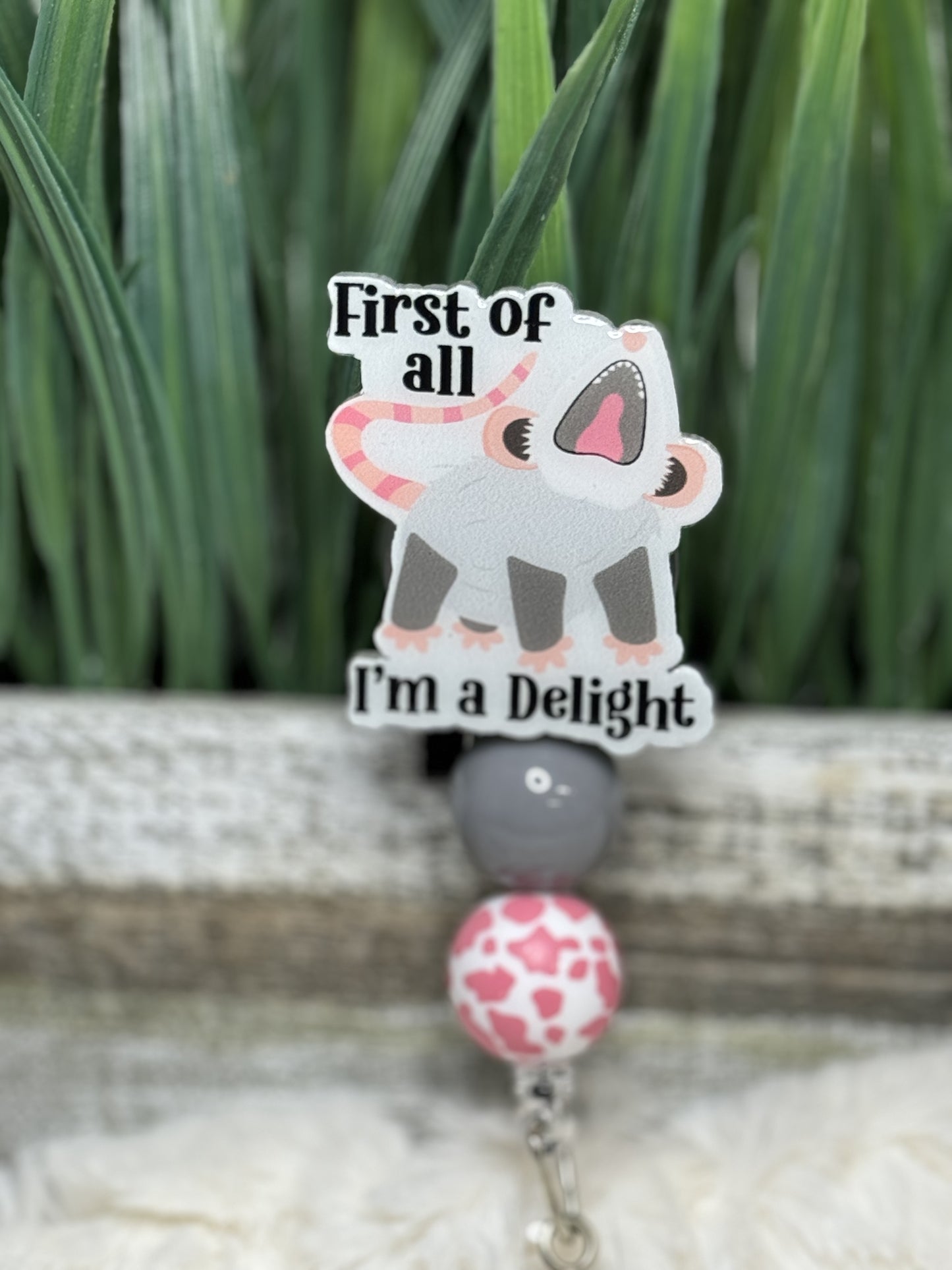 First Of All I Am A Delight Badge Reel