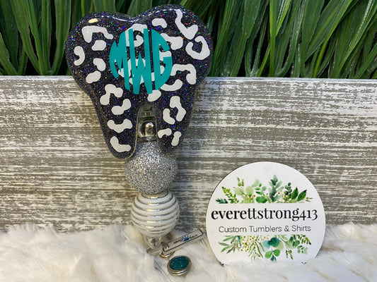 Tooth Monogram Badge Reel